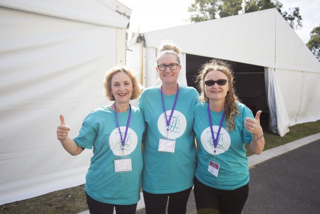 Three of our amazing Breast Cancer Care WA volunteers helping out at one of our events. 