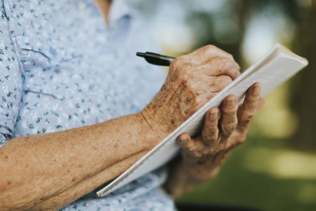 Breast Cancer Statistics Australia - older woman writing notes