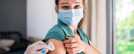 Person Receiving COVID 19 immunisation