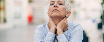 woman experiencing symptoms of menopause